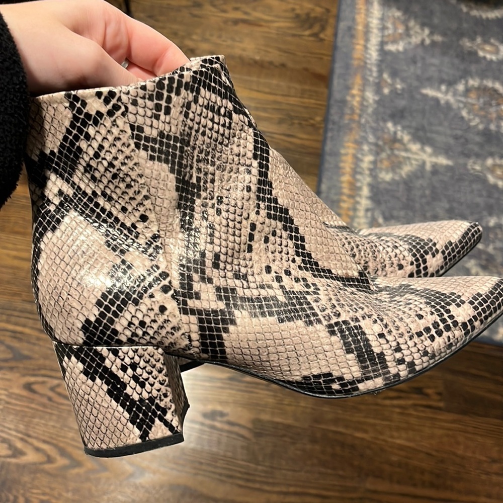 Marc Fisher snakeskin booties with a heel